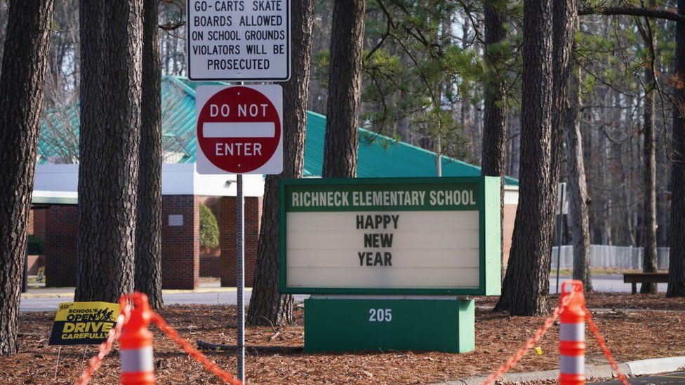 A school sign wishing students a "Happy New Year" is seen outside Richneck Elementary School on January 7, 2023 in Newport News, Virginia.