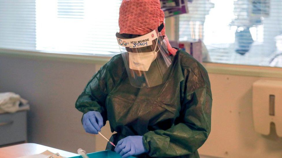 A nurse in PPE