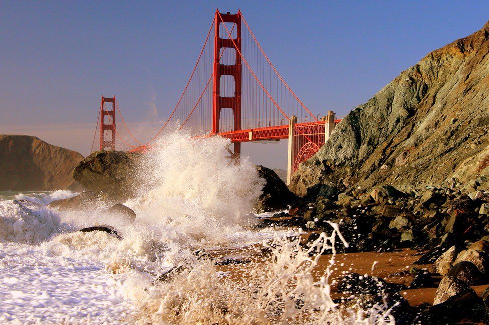 Waves splashing in front of the Golden Gate Bridge