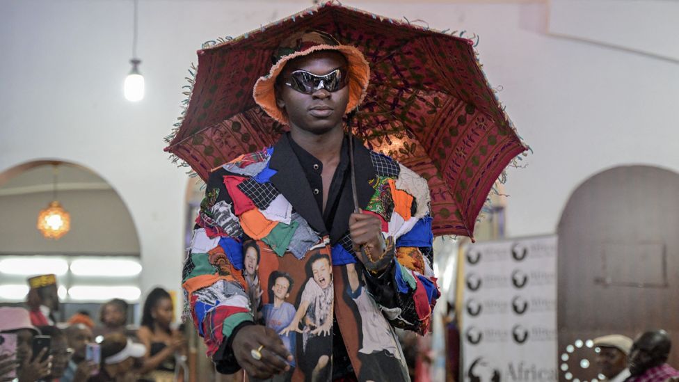 A model presents a creation during the main fashion show of the Africa Fashion Week, at the delight technical college in Nairobi, Kenya - Saturday 9 December 2023