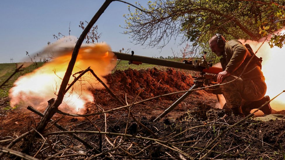 Ukrainian soldier firing an anti-tank grenade launcher at a front line near Bakhmut on 3 May