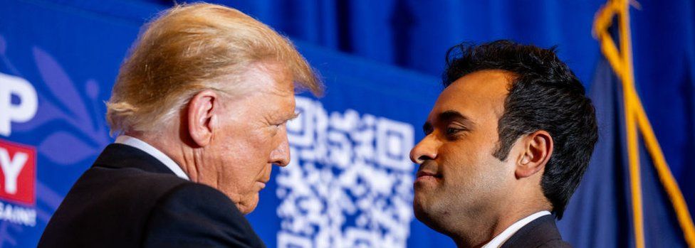 Donald Trump greets Vivek Ramaswamy at a campaign rally in New Hampshire in January