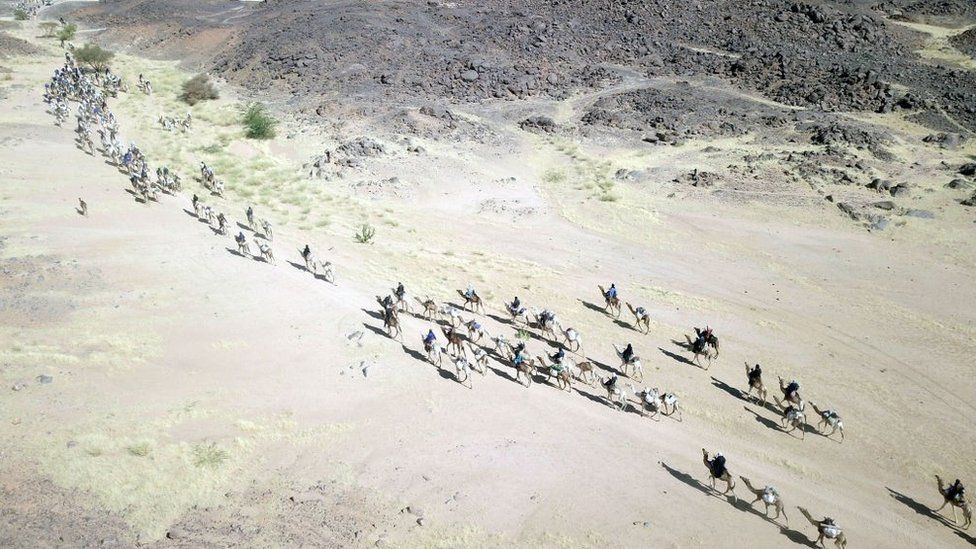 An aerial image shows a Touareg caravan proceeding towards Iferouane, Niger, on February 14, 2020