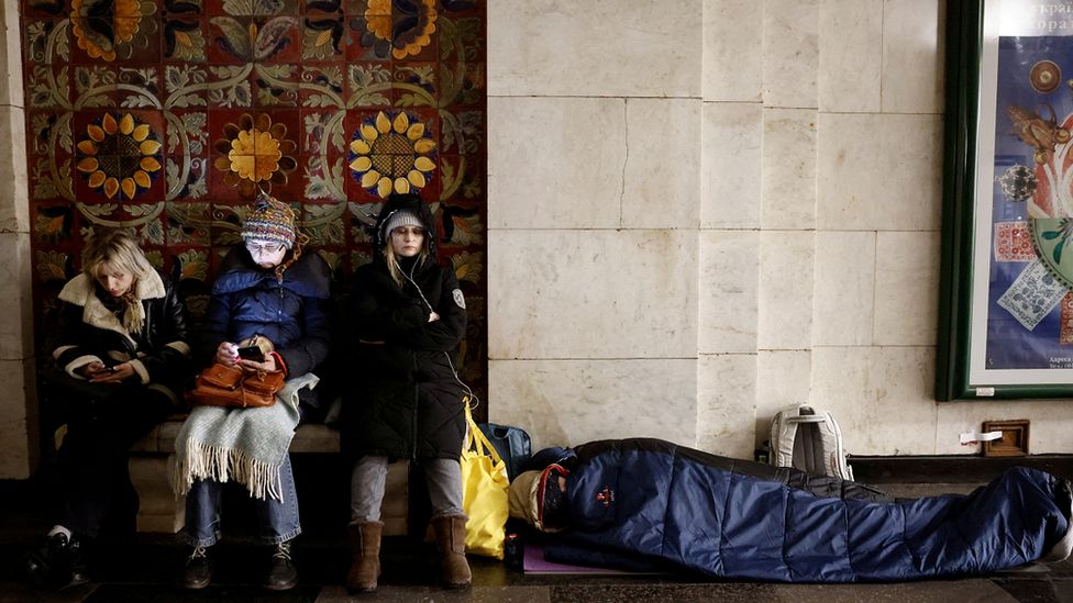 People take shelter in a metro station during a Russian missile strike, amid Russia's attack on Ukraine, in Kyiv, Ukraine, March 24, 2024.