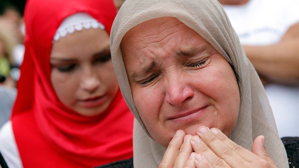 Bosnian women pay their last respects to the remains of 136 identified Bosnian Muslims ahead of a burial ceremony in Sarajevo, Bosnia and Herzegovina, 09 July 2015.