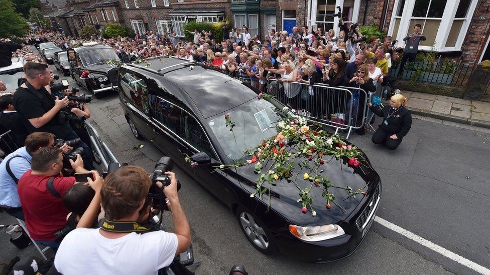 The coffin of Cilla Black makes its way to St Mary"s Church in Woolton, Liverpool, ahead of her funeral service