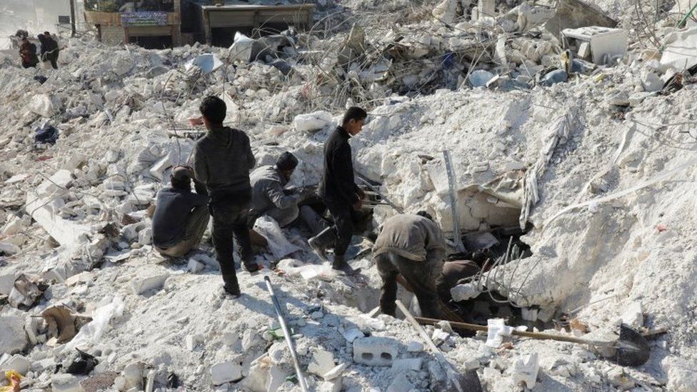 People search through the rubble in the rebel-held town of Harem, north-western Syria. Photo: 13 February 2023