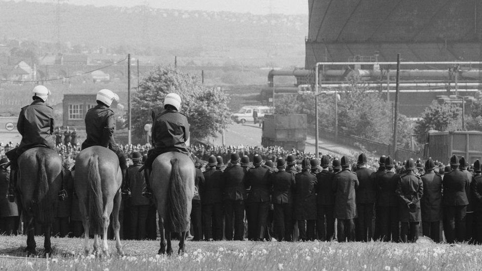 Large numbers of police are deployed at Orgreave Colliery, South Yorkshire, during a picket by striking miners, 30th May 1984