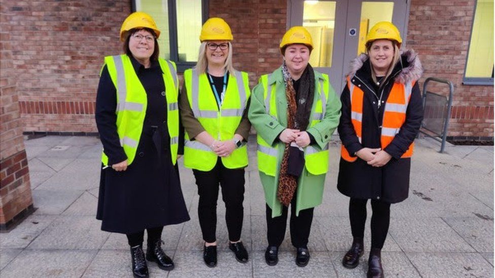Julie Reed (far left) and Scunthorpe MP, Holly Mumby-Croft (second from right), pictured at the Tree Tops complex care campus