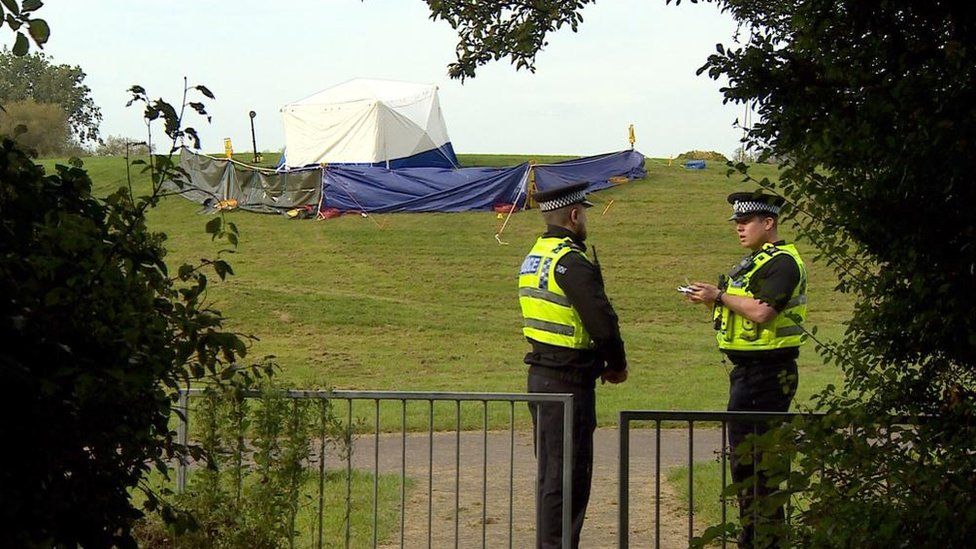 Police forensics tent in park land off May Close