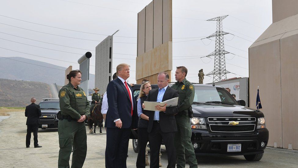 US President Donald Trump inspects border wall prototypes in San Diego, California.