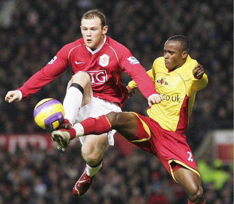 Bangura and Wayne Rooney