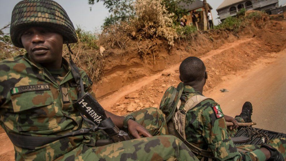 Nigerian soldiers patrol Aba city, in a pro-Biafra separatists zone, southeastern Nigeria, on February 15, 2019 during a military patrol