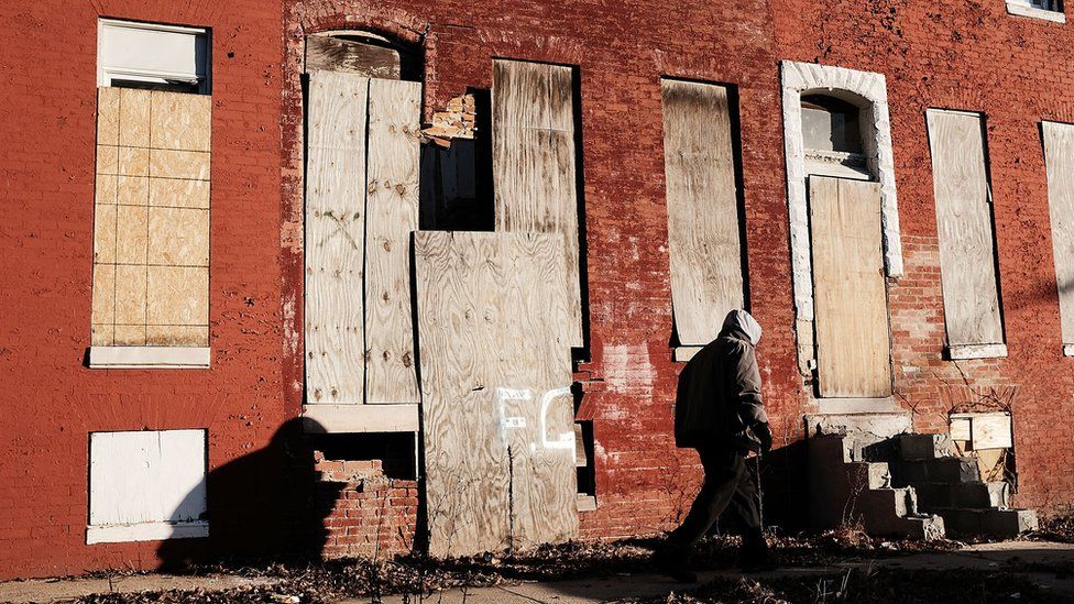 Abandoned buildings stand in a neighbourhood with a high murder rate on February 3, 2018 in Baltimore, Maryland.