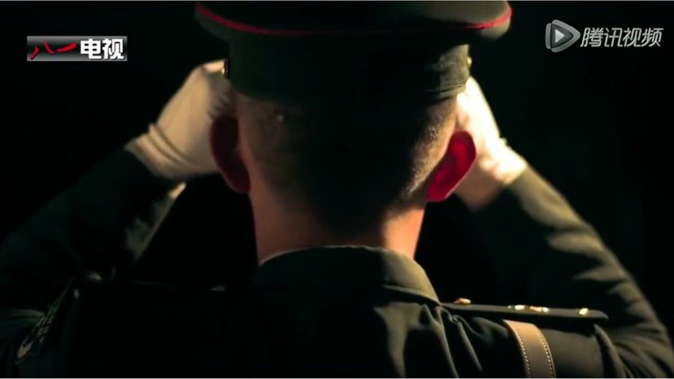 Shot of the back of the head of a soldier in dress uniform