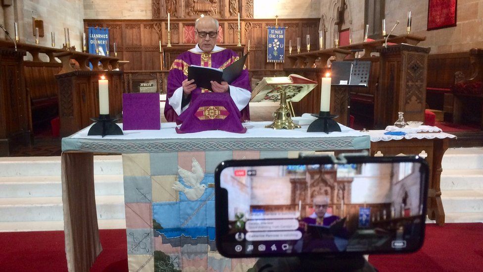 A church service being recorded for streaming in Llandudno