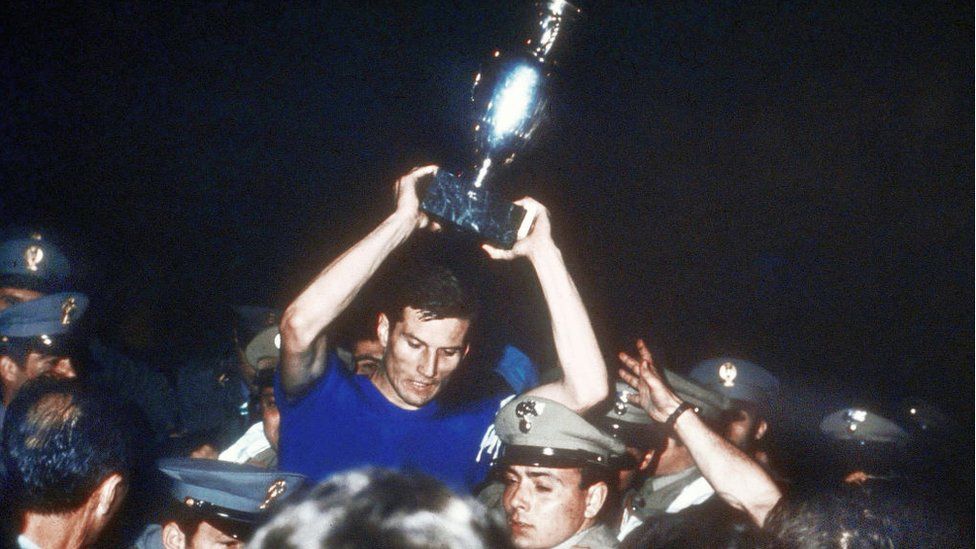 Italy captain Giacinto Facchetti lifts the Euros trophy in 1968