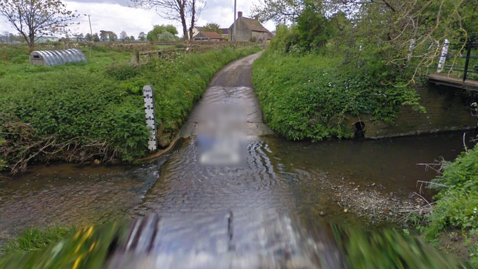 Woman trapped in car is rescued from Sherborne floods BBC News