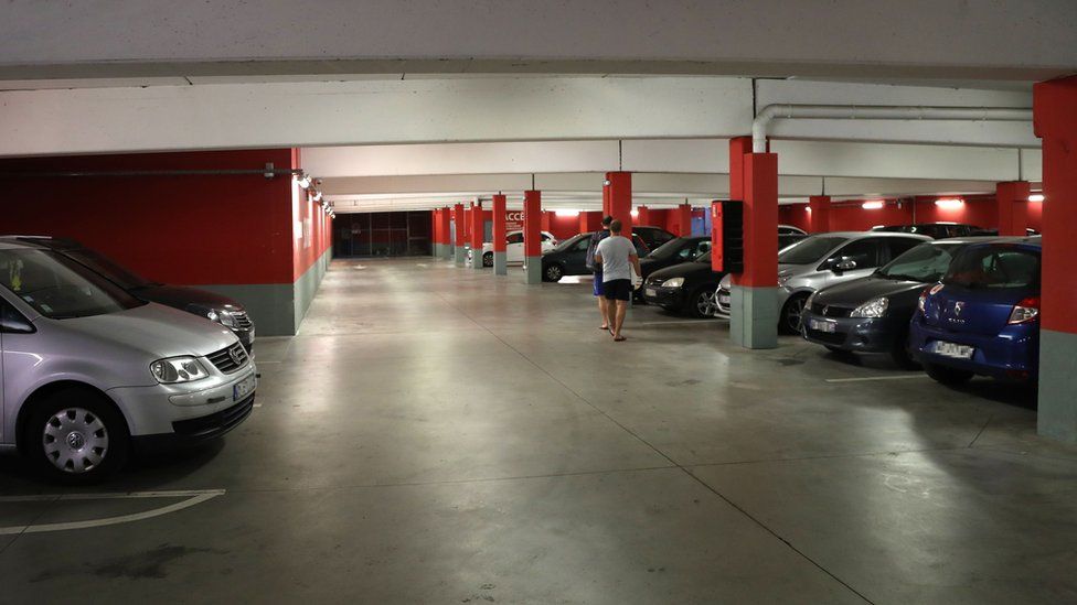 A picture taken on 25 July 2018 in the northern Paris suburb of Sarcelles shows the car park where the car abandoned by French robber Redoine Faid was found