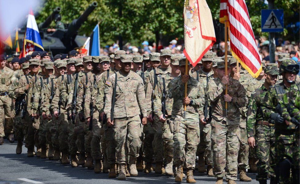 US soldiers march in Warsaw in 2017
