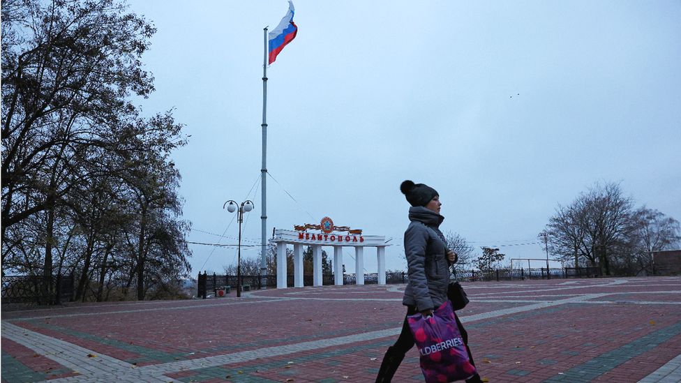 A Russian flag stands over Melitopol, a Ukrainian city occupied by Russia