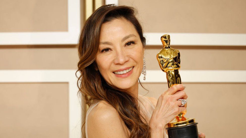 Michelle Yeoh holds Best Actress Oscar for Everything everywhere All at Once
