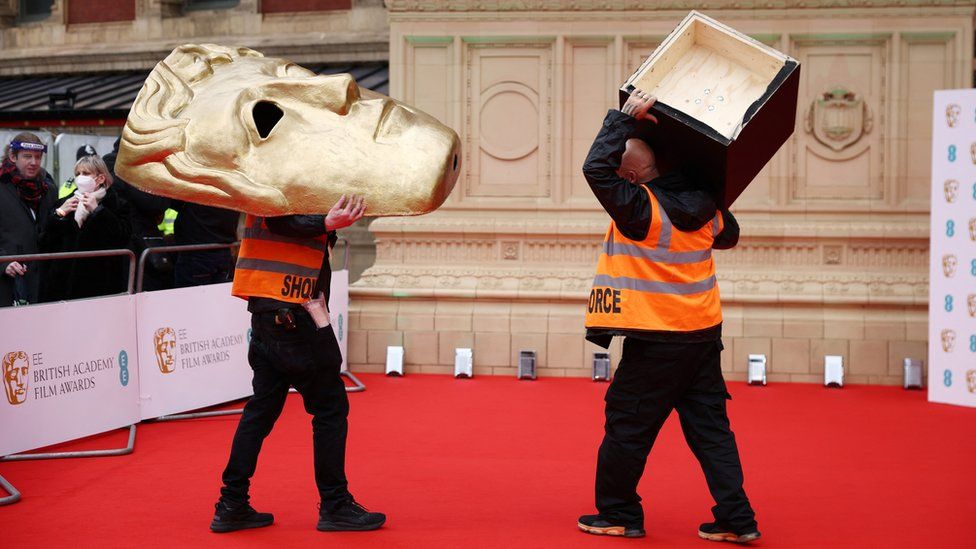 Members of staffs work ahead of the 75th British Academy of Film and Television Awards (BAFTA) at the Royal Albert Hall in London