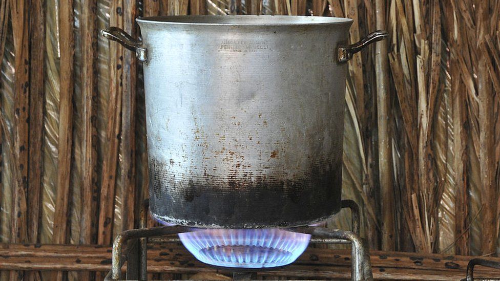 Large pot on cooking stove
