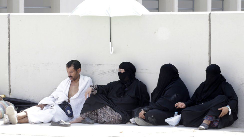 Pilgrims shelter from the heat near Mecca. 24 Sept 2015
