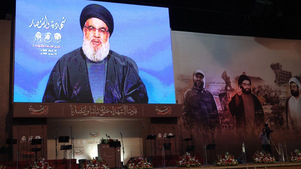 Supporters of the Lebanese Shia movement Hezbollah attend a televised speech by the group's leader Hassan Nasrallah in Beirut's southern suburbs, on February 16, 2023