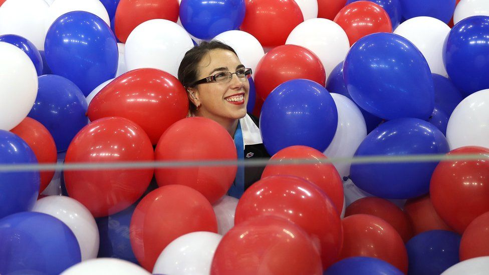 Woman inside balloons
