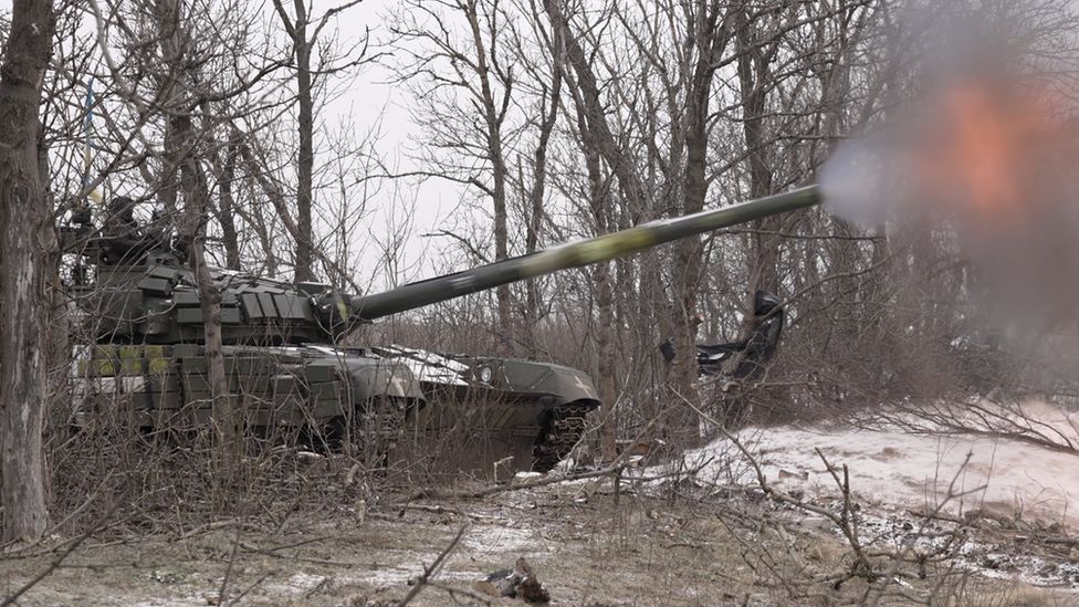 A tank firing on the front lines of Ukraine