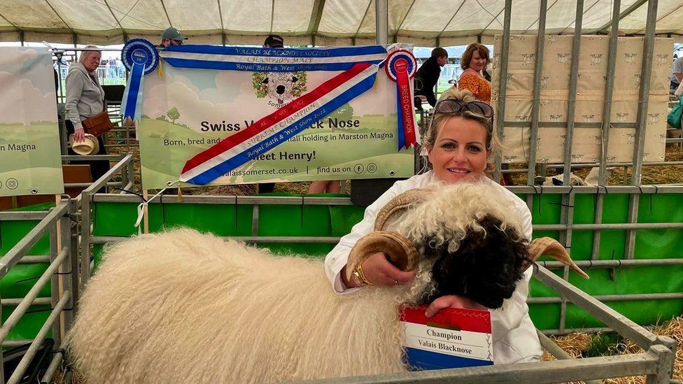 Carla McLeod Bunter with one of her Valais Blacknose sheep