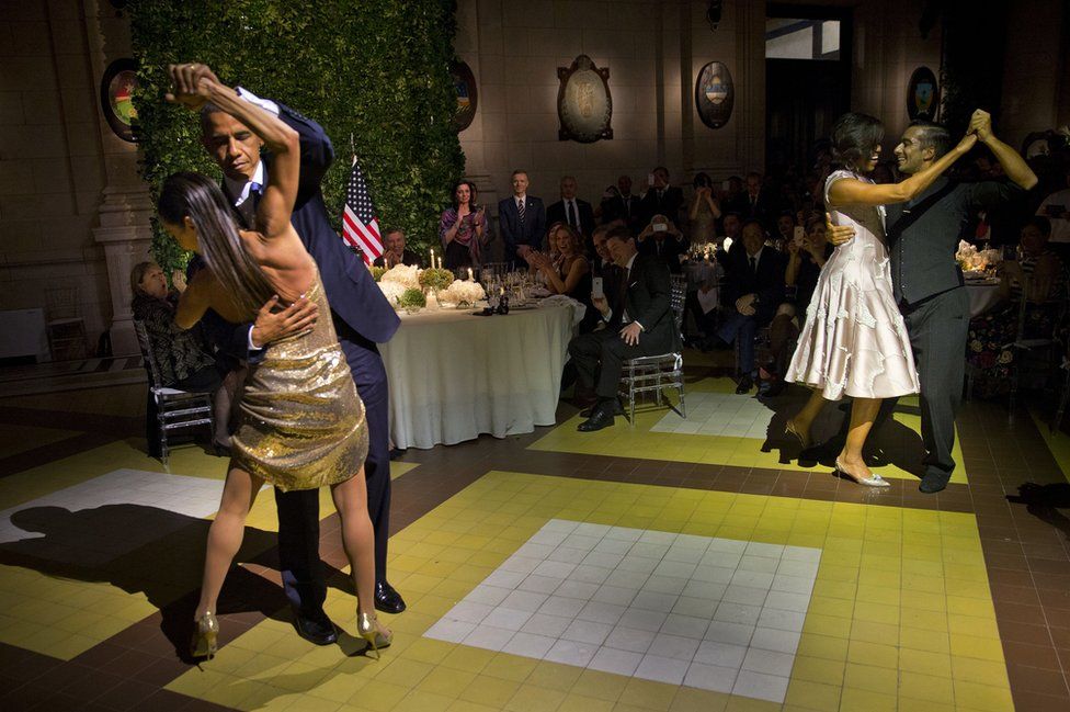 US President Barack Obama and first lady Michelle Obama, right, dance the tango with tango dancers during the State Dinner at the Centro Cultural Kirchner in Buenos Aires, Argentina, on 23 March 2016.