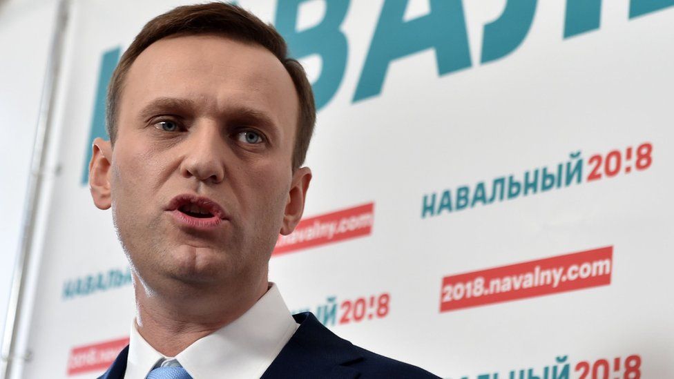 Russian opposition leader Alexey Navalny delivers a speech during a meeting with his supporters in Moscow