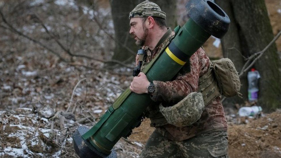A Ukrainian soldier holds a Javelin anti-tank missile