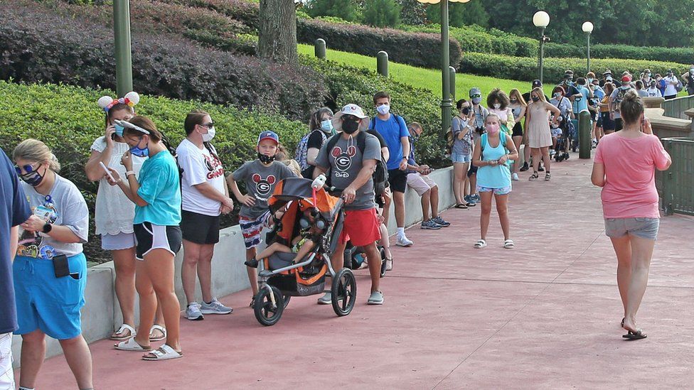 People queue outside Walt Disney World