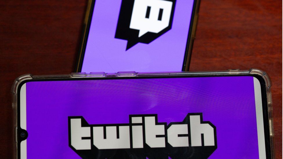 The Twitch logo on a phone screen