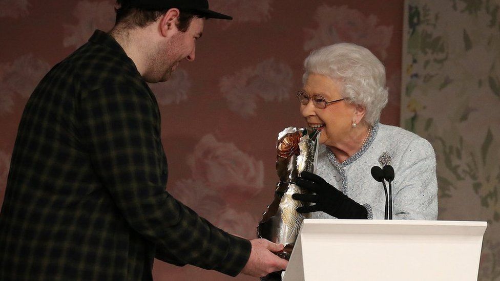 The Queen presents award to Richard Quinn