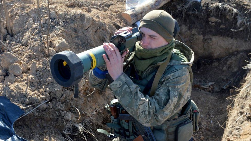 Image shows soldier holding anti-tank rocket launcher