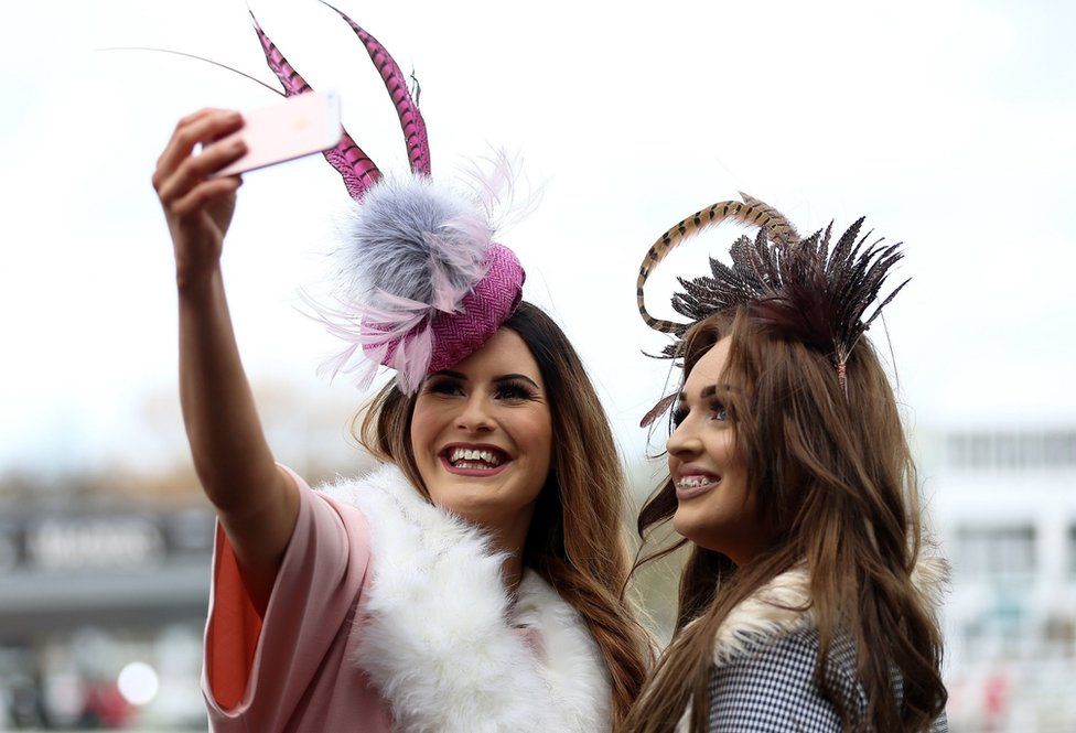 Racegoers during Ladies Day of the 2019 Cheltenham Festival