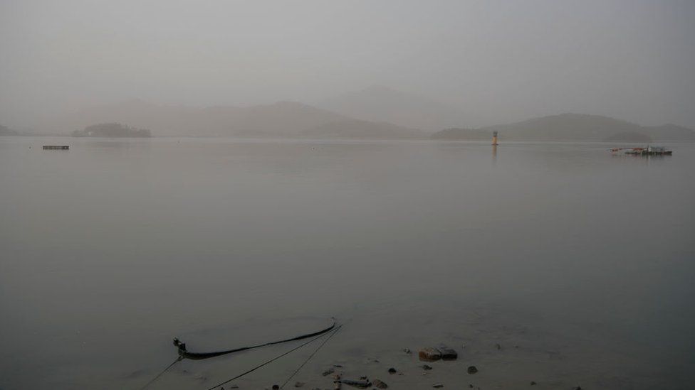 Yellow dust from the deserts of China and Mongolia blanket a lake in Seoul, South Korea