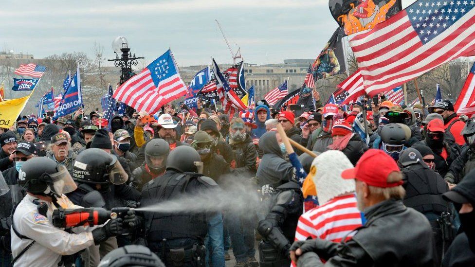 Trump supporters clash with police and security forces as people try to storm the US Capitol Building in Washington, DC, on January 6, 2021