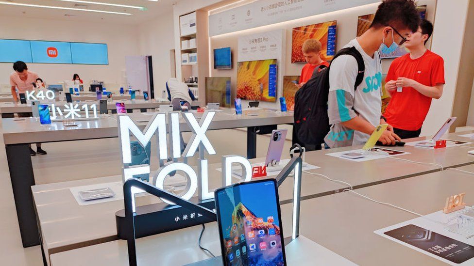 Xiaomi's first Mix foldable smartphone and Redmi K40 at the store in Shanghai, China.