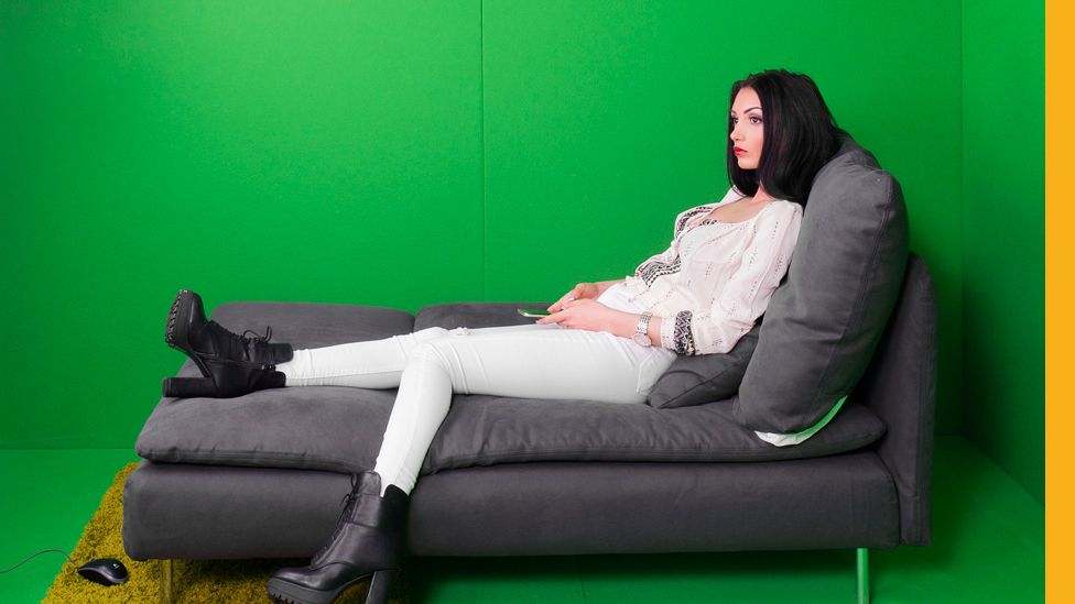 model in front of greenscreen