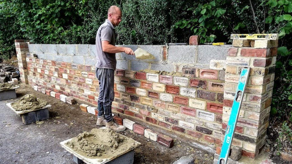 Mark Tilney laying the heritage wall at Path Head Water Mill