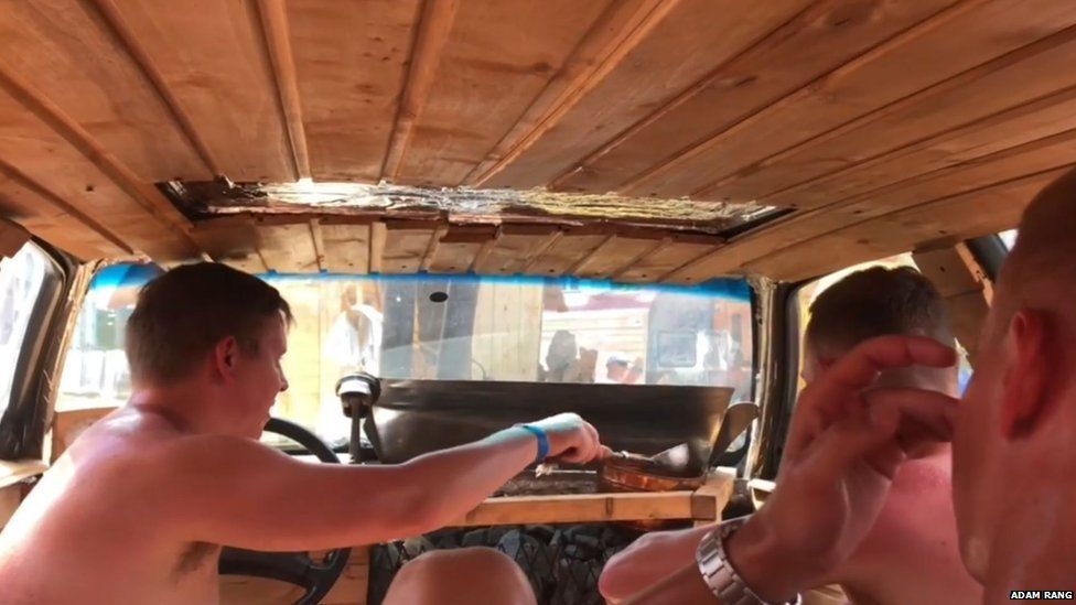 Men inside sauna car