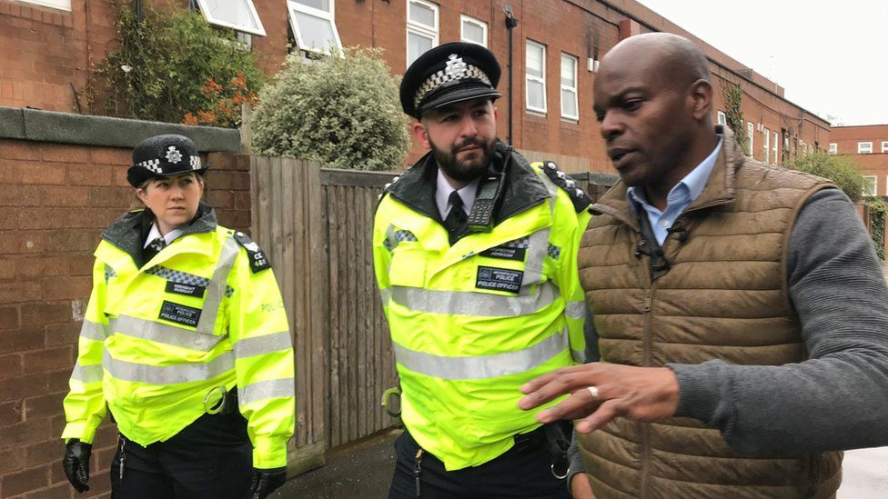 Mayoral candidate Shaun Bailey with police officers