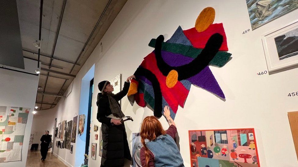 Artists take down their work