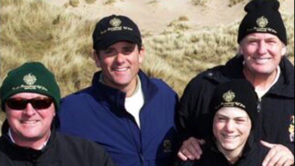 Neil Hobday (far left) with Donald Trump (far right) during his first visit to Aberdeenshire in 2006